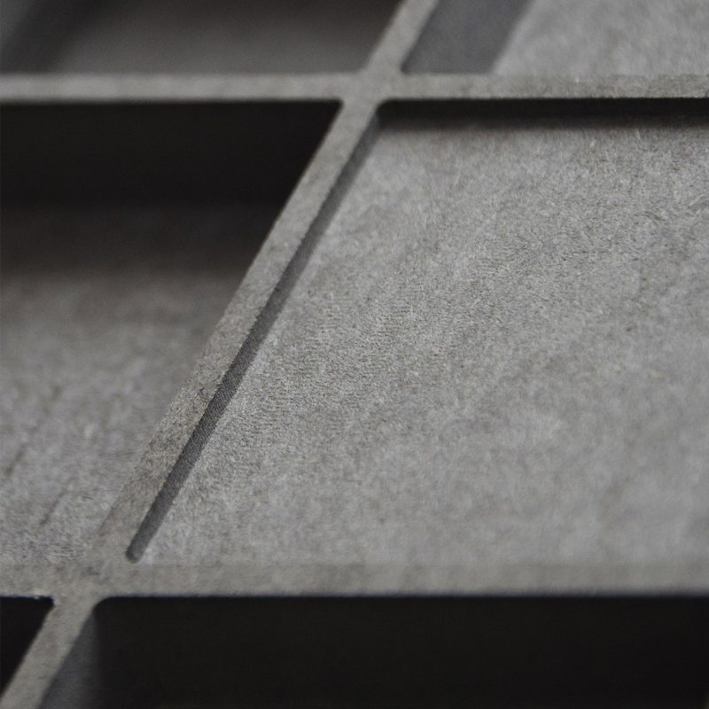 Close-up of the QRD diffuser's black, three-dimensional surface