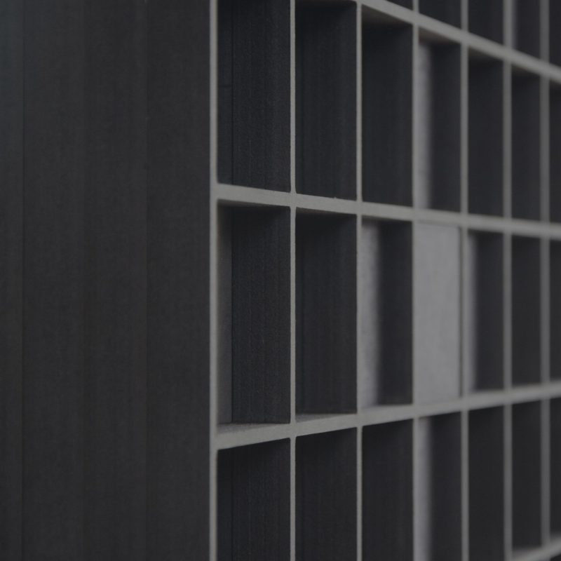 The QRD Tiles 2D diffuser at an angle - cells of varying depth milled in furniture board