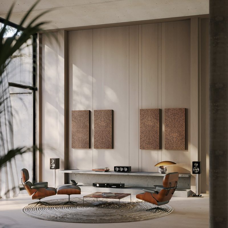 The Binary Diffuser in Mahogany behind the listening position in a living room with armchairs and speakers