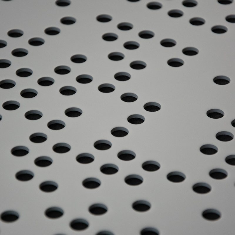 Close-up of the milled binary pattern of the Binary Diffuser's front in Grey