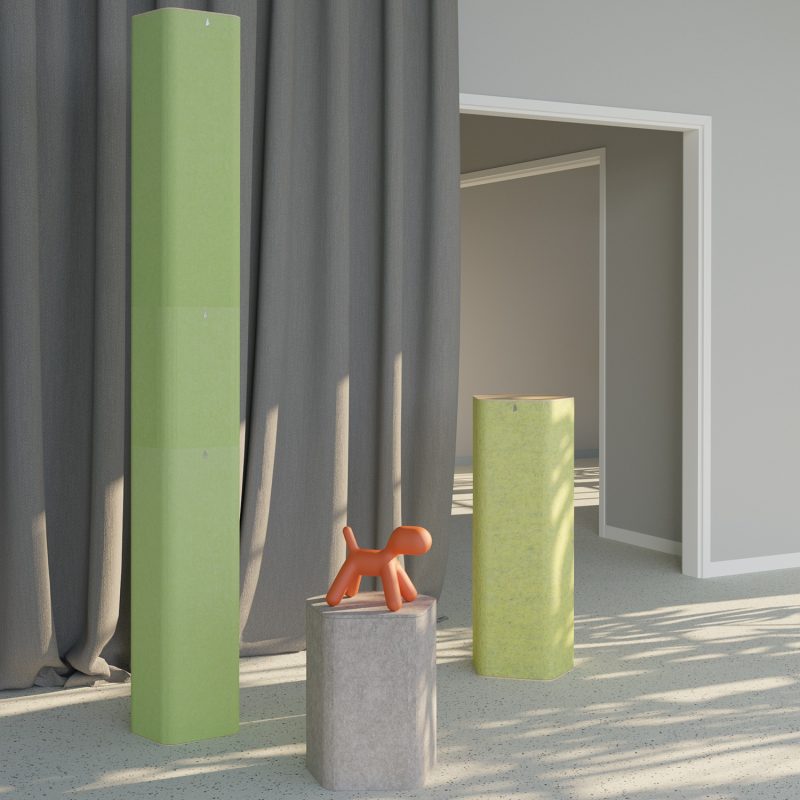 Colorful Pro.Felt totems in the corner of a home interior
