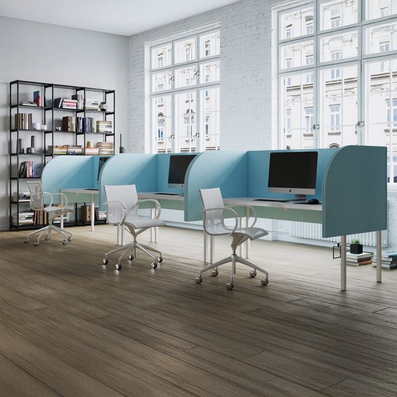 The three-panel divider around a workstation in an open space