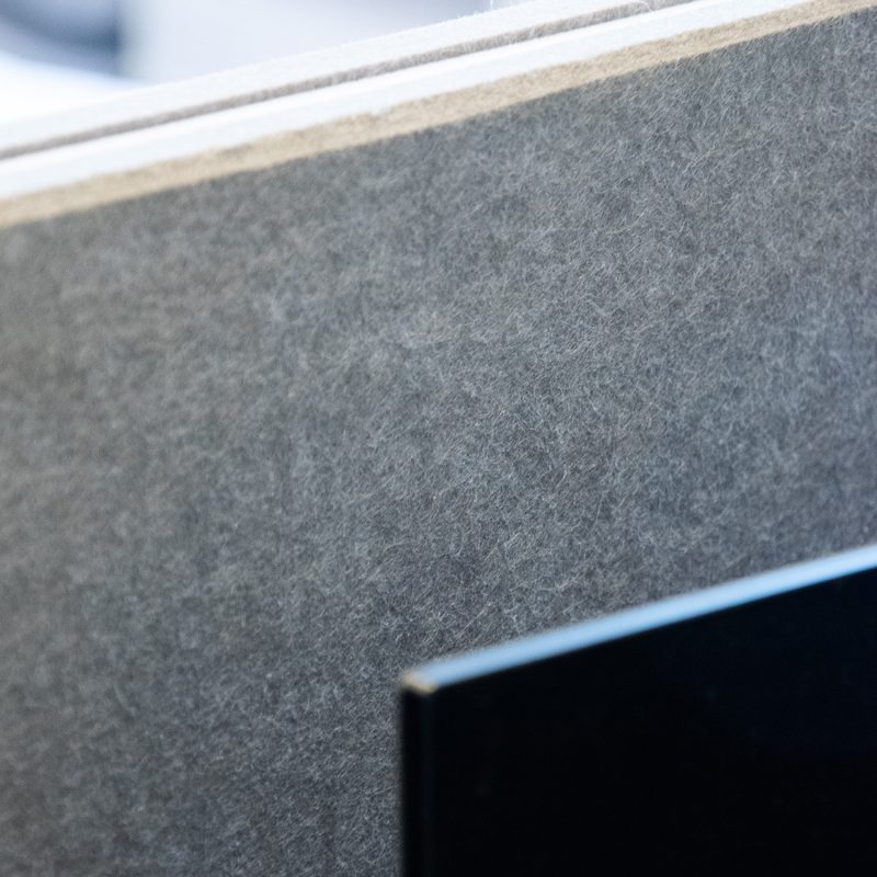 A detail of the panel's fixing to the desktop's side edge